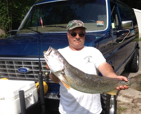 CJ Polhamus  with his 30" spring tide runner weakfish