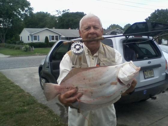  Jack with a 26" summer flounder. He caught it with his  flounder fly. 