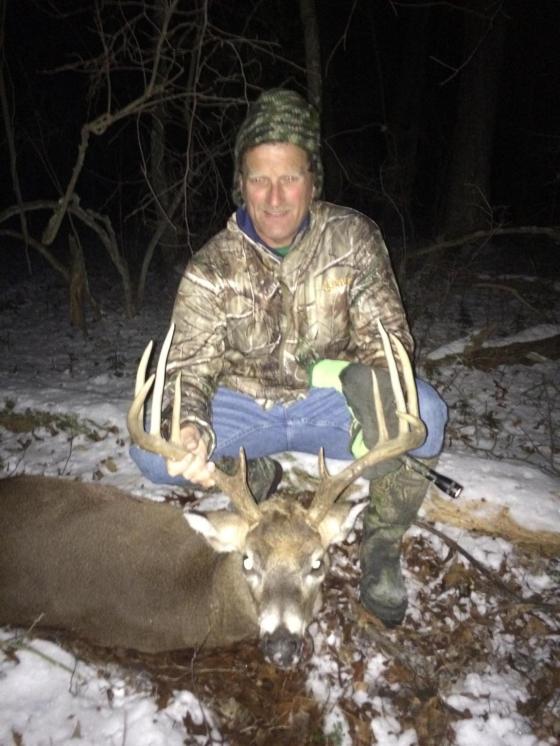 Jeff Tomlin and his 10pt. high pressured  public land  buck. 