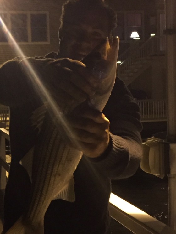 Justin is one of the few to catch striped bass during this extended NE wind. 